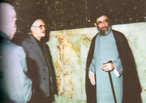 Visit of Ayatollah Khamenei from Imam Reza Shrine during his presidentship; the Late Ghaniyan as Astan Quds Ceremonies Official stand Beside him.